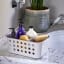 Joseph Joseph EasyStore Medium Bathroom Storage Basket with products in on counter