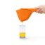 Dreamfarm Orange Fluicer Juicer with a glass of orange juice