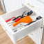 Dreamfarm Orange Fluicer Juicer in the utensils drawer