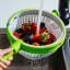 Dreamfarm Spina Salad Spinner & Colander rinsing strawberries