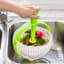 Dreamfarm Spina Salad Spinner & Colander rinsing in the sink