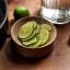 La Porte Blanche Dulce Wooden Decorative Bowls, Set of 2 on the table with sliced lime