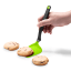 Dreamfarm Mini Chopula Spatula - Green lifting a cookie