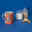 Omada Coffee Mug, 350ml - Zebra with coffee, milk, sugar and cookies