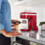 KitchenAid Artisan Espresso Machine  - Empire Red on the kitchen counter