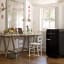 Smeg Retro 50's Style Bar Refrigerator - Glossy Black next to the study desk