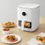 Xiaomi Smart Air Fryer 4L on the table with food