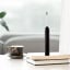 Usmile Sonic Electric Toothbrush P1 - Black on the table