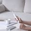Usmile Sonic Electric Toothbrush P1 - White on the table charging