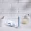 Usmile Sonic Electric Toothbrush P1 - Blue next to the basin