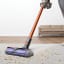 Dyson V10 Absolute Cordless Vacuum on the carpet 