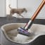 Dyson V10 Absolute Cordless Vacuum on the pet bed