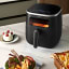 Philips 3000 Series XL Digital Airfryer with Window, 5.6L with food on the kitchen island