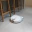 Hobot Legee D8 Robot Vacuum Cleaner and Mop next to chairs