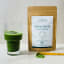 SANA Organic Matcha Green Tea with a glass of green tea