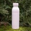 Built Planet Eco Friendly Recycled Water Bottle, 500ml - Pale Pink on the grass