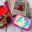 Crunchbox Classic 5 Pink Compartment Lunchbox -  Unicorn on the table with books