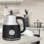 Swan Retro Cordless Kettle with Gauge, 1,7L - Black on the kitchen counter