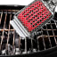 OXO Good Grips Hot Clean Grill Brush with a grill stand