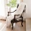 Linen House Decadence Fur Throw - Pearl hanging on. the chair