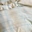 Linen House Geena Duvet Cover Set in Sky - King detail on the bed