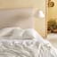 Linen House Eloise Duvet Cover Set in Vanilla - King detail on the bed