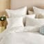 Linen House Eloise Duvet Cover Set in Vanilla - King detail on the bed