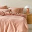 Linen House Raquelle Duvet Cover Set in Pink Clay - King detail on the bed