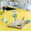 Brabantia Make & Take Water Bottle with Strainer, 500ml - Jade Green on the table with cucumber 