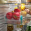 Joseph Joseph FridgeStore Large Fridge Storage Bin with fruits in the fridge