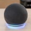 Amazon Echo Dot 5th Gen Smart Speaker - Charcoal on the table