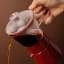 La Cafetiere Verona Glass Espresso Maker, 6-Cup - Red pouring espresso