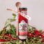 Skote Petoors Delicacies Chilli Crisp Oil With Wooden Spoon, 250ml with chilli on the table