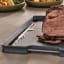 Joseph Joseph Cut and Carve Plus Chopping Board, Large - Sky on. the table