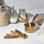 Trendz Of Today Gold & Wood Measuring Cup and Spoon Set on the kitchen counter