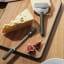 Eva Solo Green Tools Cheese Slicer on the table with cheese