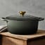 Le Creuset Thyme Signature 6.7 Litre Round Cast Iron Casserole, 28cm on the table