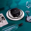 Airtender Electric - Black on table with wine glass and bottle