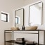 Hertex HAUS Small Varese Mirror - Matte Black on the wall in a bathroom