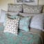 India Ink Aqua French Toile Kantha Stitched Throw - Double on the bed