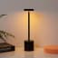 Haus Republik Chronos Portable & Rechargeable Lamp - Black on the table