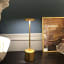 Haus Republik Chronos Portable & Rechargeable Lamp - Gold on the table