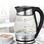 Milex Glass Kettle, 1.7L on the table with a cup of coffee