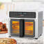 Milex Deluxe Rotisserie Airfryer, 24L on the table with food