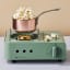 Tastelab Mini Cassette Gas Stove - Sage with a pan of popcornpan