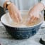 Tala Indigo and Ivory Stoneware Mixing Bowl, 5.5L with flower on the table