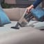 Miele TriFlex HX2 Performance Cordless Stick Vacuum Cleaner on the couch