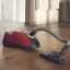 Miele Complete C2 PowerLine Cylinder Vacuum Cleaner on the wooden floor