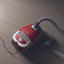 Miele Complete C2 PowerLine Cylinder Vacuum Cleaner on the wooden floor