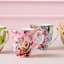 Maxwell & Williams Estelle Michaelides Enchantment Coupe Mugs, Set of 4 on the table